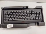 a black keyboard and mouse on a white table