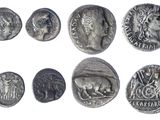 an image of a collection of ancient roman coins on a white background
