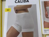 three boxes of calida underwear sitting on top of a table