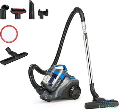 a vacuum that is sitting on the floor next to other items