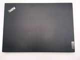 a laptop that is sitting on a white table