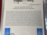 an open book with a picture of a plane on it