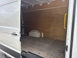 a white van that is open with the door open