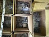 many boxes of assorted electronics in a room
