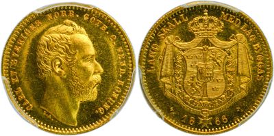 a gold sovereign coin with a crown on it