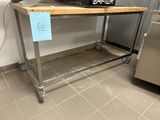 a microwave sitting on top of a table in a kitchen