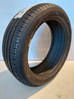 a close up of a tire on a white surface