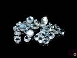 de très jolis diamants blancs sur un fond noir