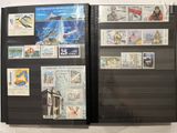 a lot of stamps on the cover of a book