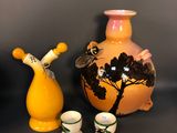 three vases that are next to each other on a table