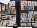 a lot of stamps on display on a table