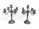 a pair of silver plated candelabs