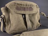an image of a bag with a strap on it