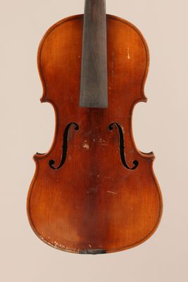an old violin with a bow on a white background