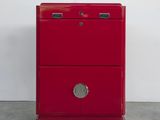 a red cabinet with two drawers on top of it