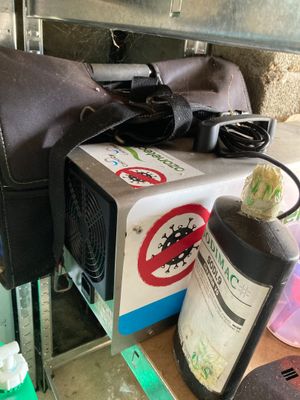 a brown bag and a black bag sitting on a table