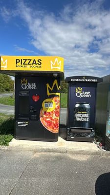 two vending machines on the side of the road