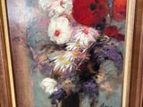 une peinture de fleurs dans un vase sur une table