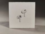 two airpods that are sitting on top of a white box