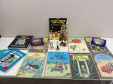 a table with many books and a toy on it