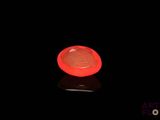 an image of a red object on a black surface