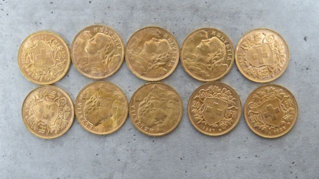 Dix pièces de monnaies en or à valeur faciale de 20 francs Suisse...