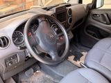 a car that has a steering wheel and dashboard in it