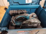 a blue tool box with tools inside of it