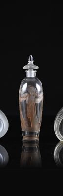 three glass vases sitting next to each other on a black surface