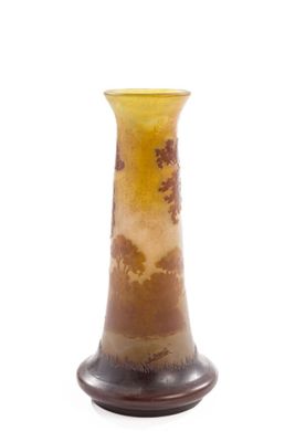 a vase that is sitting on a white surface