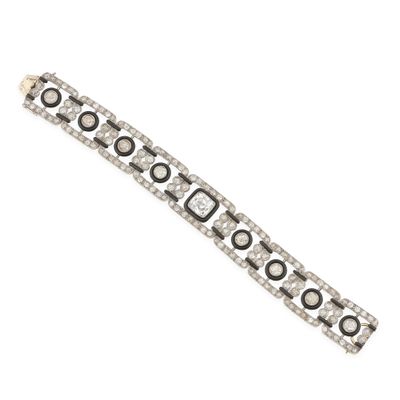 an art deco bracelet with black and white stones