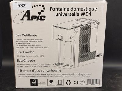 une photo d'un purificateur d'air posé sur une table