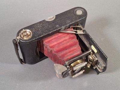 a small camera that is sitting on a table