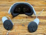 a pair of headphones sitting on a wooden table