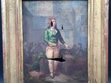 tableau représentant un homme vêtu d'une veste verte, avec un chat noir devant lui