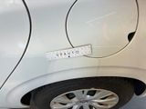 a sticker on the side of a white car