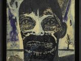 une image représentant un tableau représentant le visage d'un homme, dans un cadre noir