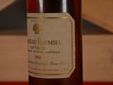 a bottle of wine that is sitting on a table