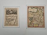 un livre ouvert sur lequel figurent deux cartes de l'Europe et de l'Asie
