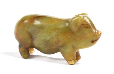 CHINE Sculpture en jade vert nuancé rouille représentant un …