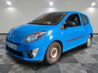 a picture of a bright blue car parked in a garage