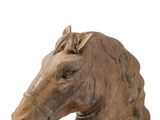 a statue of a horse head on a white background