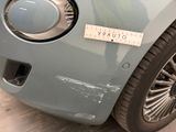a close up of a car with a sticker on the front of it