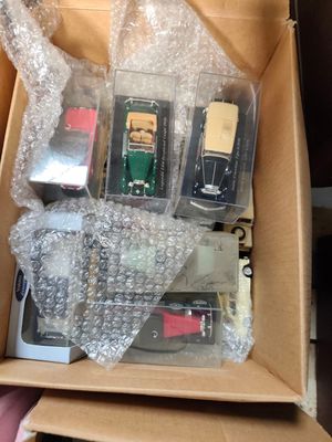 a box with a bunch of cell phones inside of it