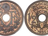 a close up of a coin with a design on it
