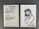an open book with a drawing of a woman on it
