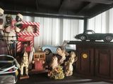 a lot of toys on a shelf in a room