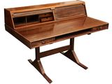 an image of a wooden desk with a drawer on it
