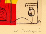 an image of a drawing of a clock on a red and yellow piece of paper