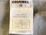 a label on the back of a chanel jacket